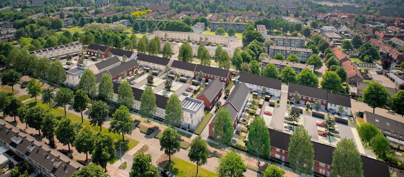 Vogelvlucht: stadswijk met rijtjeshuizen, binnenterreinen met parkeren en zonnepanelen — Ontwikkeling De Vijf van Vorst Eindhoven