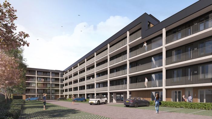 Maison L’Europe Helmond – lange galerijflat met vier woonlagen, ruime balkons en parkeerstrook aan het binnenterrein met bewoners.