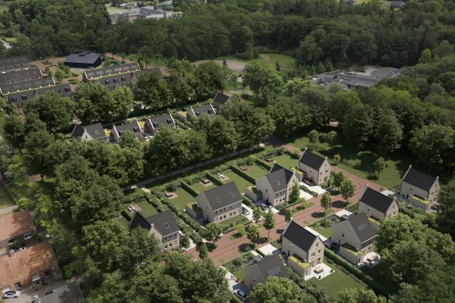 Luchtimpressie van Bosrijk Mariendaal in Velp – nieuwe woonwijk met vrijstaande woningen tussen veel groen, bomen en slingerende paden.
