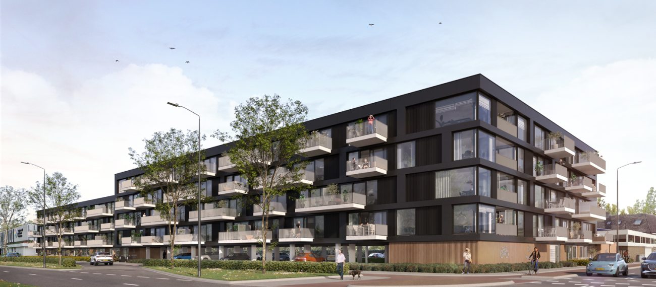 Impressie van Maison L’Europe in Helmond: modern hoekvormig appartementencomplex met donkere gevel en uitspringende witte balkons langs beide straten, omgeven door jonge bomen, voetgangers en enkele auto’s onder een heldere lucht.