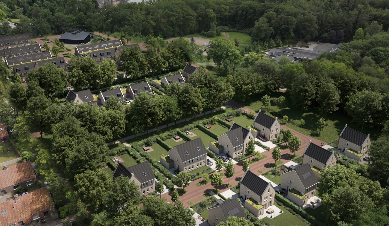 Luchtimpressie van Bosrijk Mariendaal in Velp – nieuwe woonwijk met vrijstaande woningen tussen veel groen, bomen en slingerende paden.